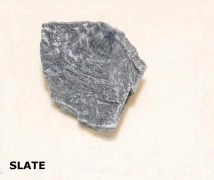 Isolated sample of a Gray Slate rock on texture background. Gray Slate Meta.. Stock Photos