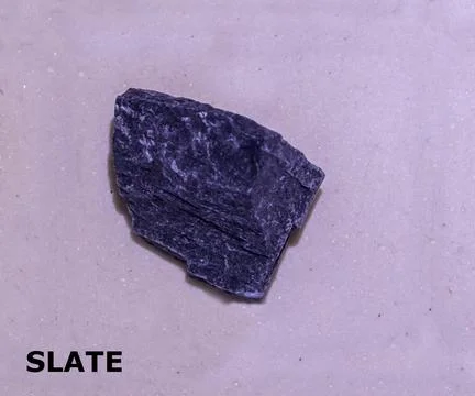 Isolated sample of a Gray Slate rock on texture background. Gray Slate Meta.. Stock-Fotos
