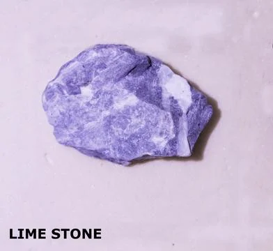 Isolated sample of a Lime Stone rock on texture background. Lime Stone Sedi.. Stock-Fotos