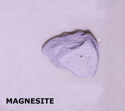 Isolated sample of a Magnesite rock on texture background. Magnesite Sedime.. Stock-Fotos