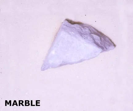 Isolated sample of a Marble rock on texture background. Marble Metamorphic .. Stock Photos