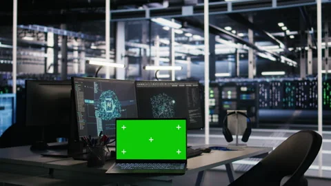 Isolated screen laptop and computer in data center overseeing server gear Stock Footage 309616950