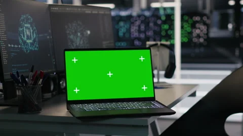 Isolated screen laptop and computer in data center overseeing server gear Stock Footage 309617934