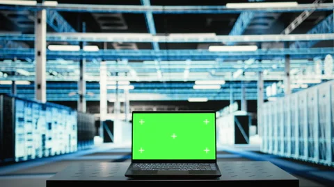 Isolated screen laptop in data center used to optimize server equipment load Stock Footage 329333677
