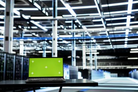 Isolated screen laptop in data center managing enterprise technology solutions Stockfoto's