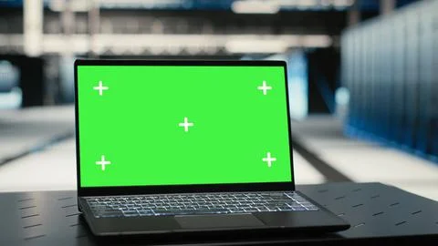 Isolated screen laptop in data center used to optimize server equipment load 스톡 사진