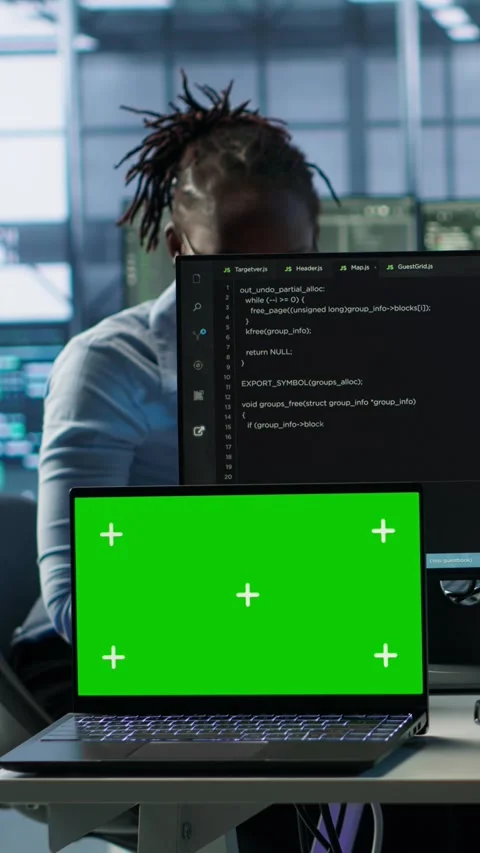 Isolated screen laptop next to programmer coding in server farm Stock Footage 319547901