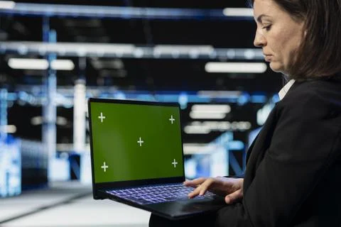 Isolated screen laptop used by data center engineer to do checkup on electronics 写真素材