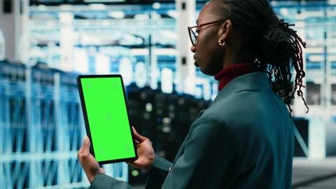 Isolated screen mockup tablet, writing code and developer in data center Stock Footage 329531484