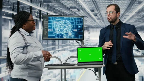 Isolated screen notebook used by colleagues monitoring semiconductors factory Stock Footage 333386875
