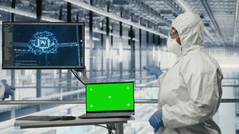 Isolated screen tablet and AI used by microchip factory worker Stock Footage 333378992