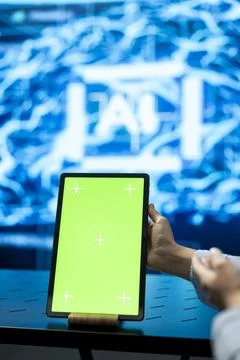 Isolated screen tablet and AI used by programmer Stock Photos