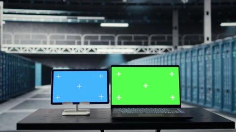 Isolated screen tablet and mockup laptop in data center doing software updates Stock Footage 317123583