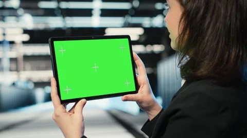 Isolated screen tablet in data center used by software developer Stock Photos