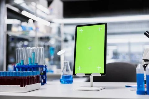 Isolated screen tablet on empty laboratory desk Stock Photos