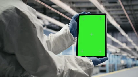 Isolated screen tablet, testing silicon wafer batches and worker Stock Footage 333391958