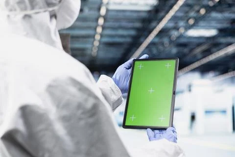 Isolated screen tablet used by hardware developer designing silicon wafers Stock Photos