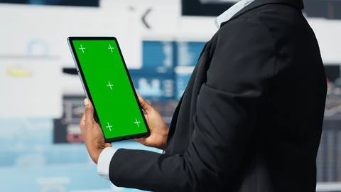 Isolated screen tablet used by manager to compare company metrics Stock Photos