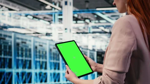 Isolated screen tablet used by server hub admin to monitor rigs Stock Footage 330088239