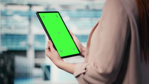 Isolated screen tablet used by server hub admin to monitor rigs Stock Footage 330378210
