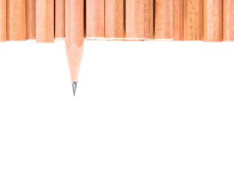 Isolated sharp pencil stand out of other brown pencils Foto stock