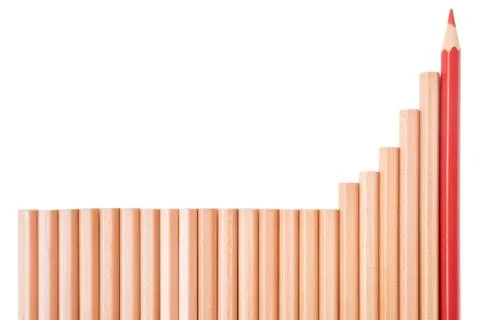 Isolated sharp red color pencil and brown pencils lay down in bar graphs shap Stock Photos