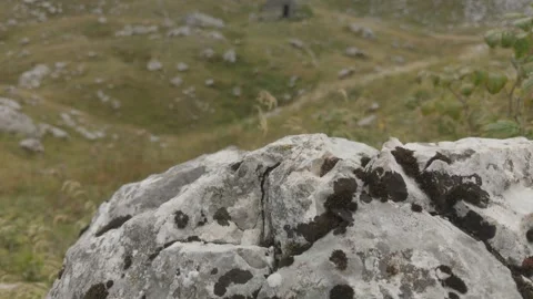 Isolated Shepherd's Hut in a Serene Mountain Valley Stock Footage 289665746