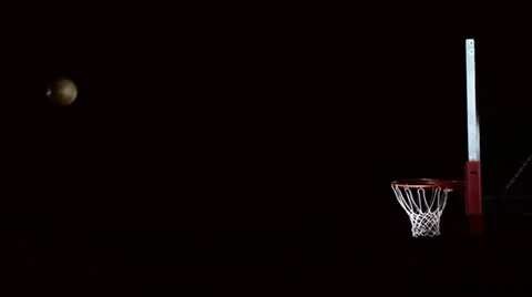 Isolated shot of a basketball hitting the rim and bouncing away Stock Footage