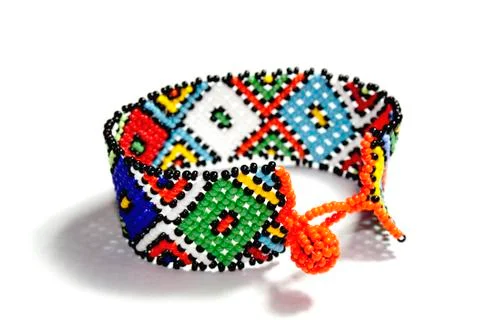 Isolated single traditional bright beadwork zulu bracelet Stock Photos