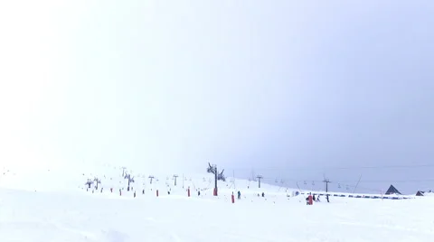 An isolated skier passing in front of the camera and making a curve Stock Footage 58961498