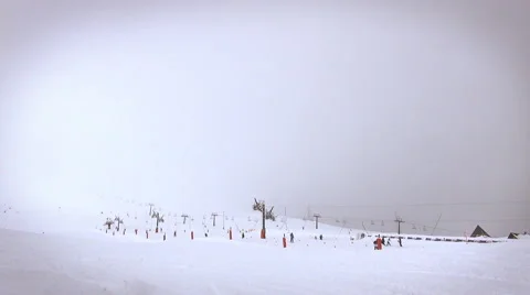 An isolated skier passing in front of the camera and making a curve Stock Footage 58961599