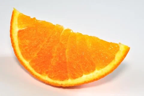Isolated slice of orange on white background Stock Photos