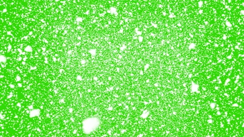 Isolated snow falls on green background Stock Footage 121604756
