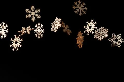 Isolated snowflake cutouts on black Stock Illustration