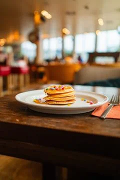 Isolated Stack of Pancake with Topping in a Restaurant Stock Photos