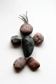 Isolated stones stack (in shape of a man) from the north coast of the seeland Stock Photos
