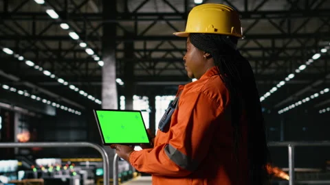 Isolated tablet, chroma key screen, african american engineer, heavy industry Stock Footage 330029450