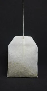 Isolated tea bag on the gray background Stock Photos