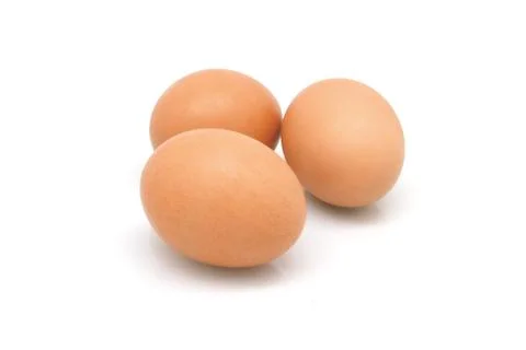 Isolated three eggs on white background Stock Photos