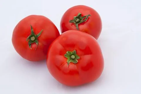 Isolated tomatoes Stock Photos