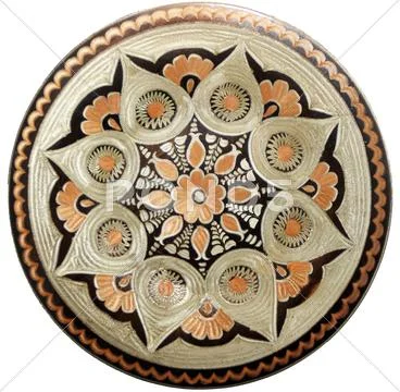 Isolated turkish copper engraved plate on a white background Stock Photos