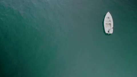 Isolated View Of A Boat Floating In The Calm Sea Of Malpica.Spain. Aerial Shot Stock Footage 238806690