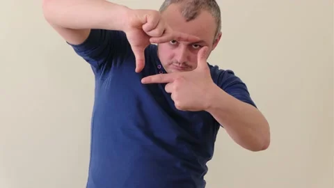Isolated view male  making frame with his fingers hands frame Stock Footage 152544078