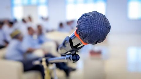 Isolated view of A Microphone in front of The Audiences Stock Photos