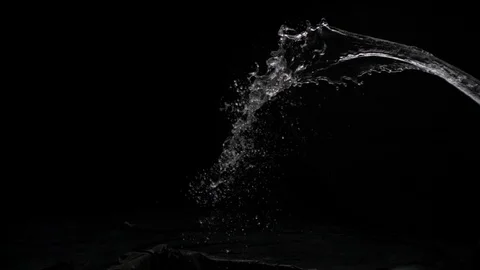 Isolated water splash on black backdrop wide shot v10 Video stock 112249743