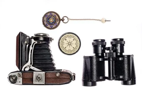 Isolated on white background objects used in travel: camera, compass, clock, Stock Photos