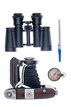 Isolated on white background objects used in travel: camera, compass, pen, bi Foto stock