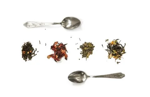 Isolated white background spoon tea. Green fruit black tea grade Stock Photos