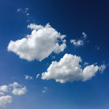 Isolated white cloud on blue sky. Beautiful blue sky with clouds background.  Stock Photos