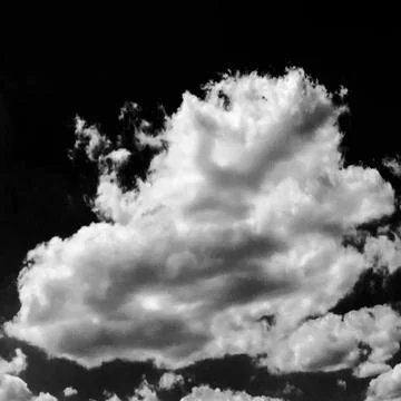 Isolated white clouds on black sky. Set of isolated clouds over black backgro Stock Photos